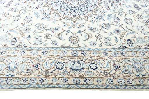Corner detail of New Nain rug showing border pattern and Wool pile