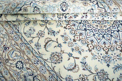 Close-up detail of New Nain rug from Iran / Persia showing Wool weave