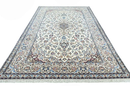 Surface texture of 2000s Nain rug with natural Wool and intricate pattern