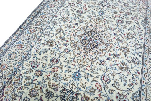 Backside of handmade 2000s Nain rug showing knot structure and weave density