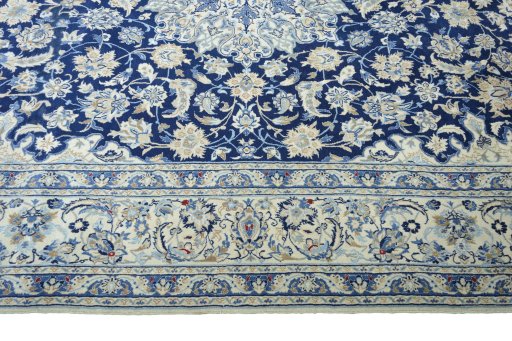 Close-up detail of 2000s Nain rug from Iran / Persia showing Wool weave