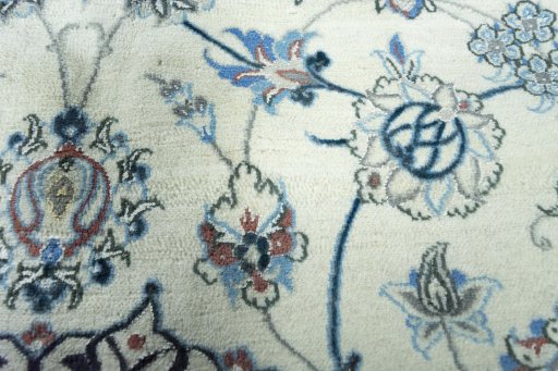 Close-up detail of 2000s Nain rug from Iran / Persia showing Wool weave