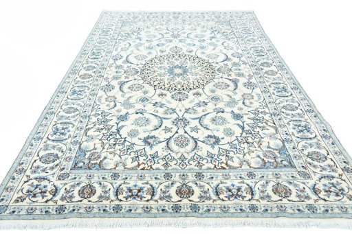 Surface texture of 2000s Nain rug with natural Wool and intricate pattern
