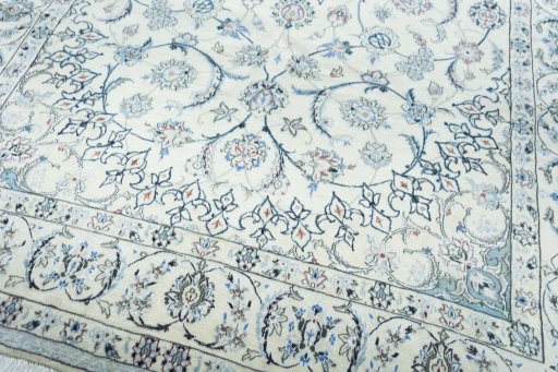 Close-up detail of 2000s Nain rug from Iran / Persia showing Wool weave