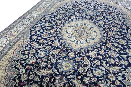 Backside of handmade 2000s Nain rug showing knot structure and weave density