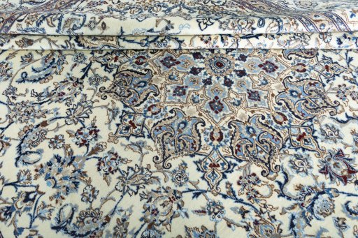 Close-up detail of 2000s Nain rug from Iran / Persia showing Wool weave
