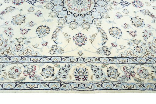Corner detail of New Nain rug showing border pattern and Wool pile