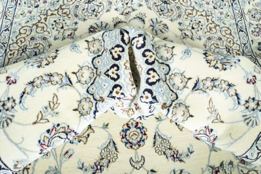 Surface texture of New Nain rug with natural Wool and intricate pattern