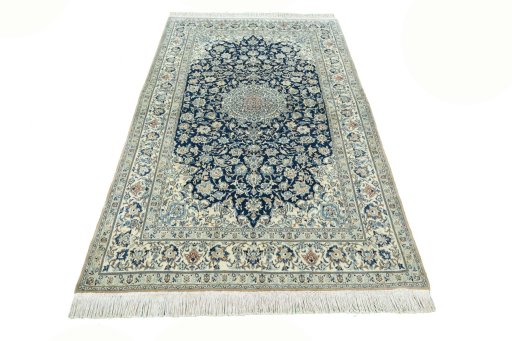 Surface texture of 1970s Nain rug with natural Cork and intricate pattern