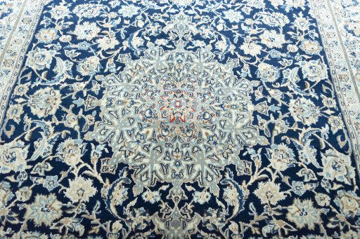 Central medallion detail of 1970s Nain rug from Iran / Persia