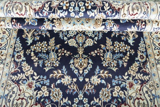 Close-up detail of 2000s Nain rug from Iran / Persia showing Wool weave