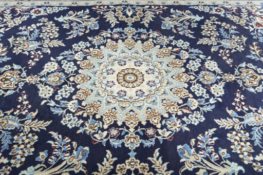 Central medallion detail of 2000s Nain rug from Iran / Persia