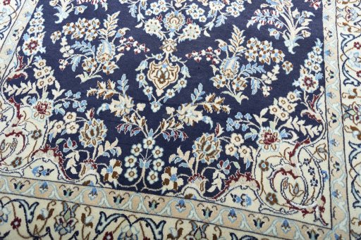 Close-up detail of 2000s Nain rug from Iran / Persia showing Wool weave