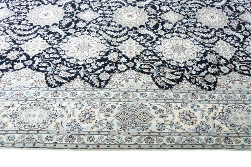 Corner detail of New Nain rug showing border pattern and Cork pile