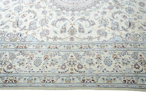 Corner detail of New Nain rug showing border pattern and Wool pile