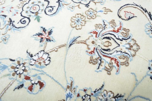 Surface texture of New Nain rug with natural Wool and intricate pattern