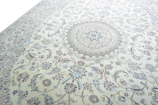 Backside of handmade New Nain rug showing knot structure and weave density