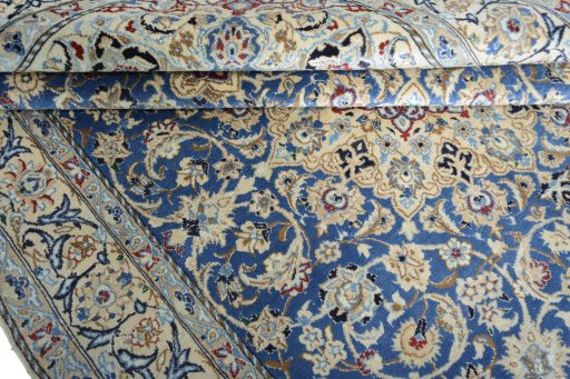 Close-up detail of 2000s Nain rug from Iran / Persia showing Wool weave