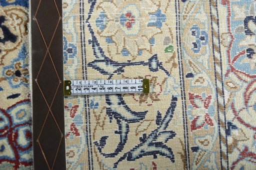 Backside of handmade 2000s Nain rug showing knot structure and weave density
