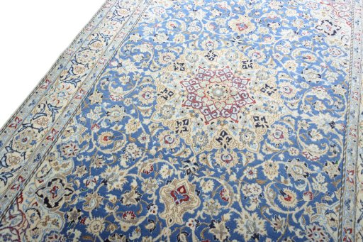 Backside of handmade 2000s Nain rug showing knot structure and weave density