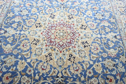 Central medallion detail of 2000s Nain rug from Iran / Persia