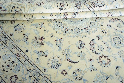 Close-up detail of New Nain rug from Iran / Persia showing Wool weave