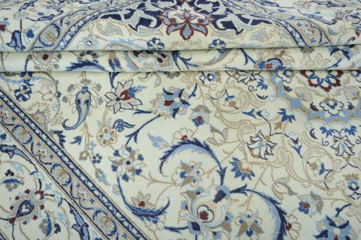 Close-up detail of 2000s Nain rug from Iran / Persia showing Wool weave