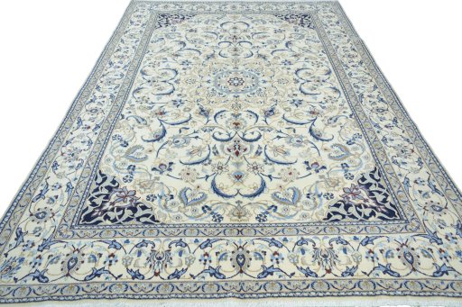 Surface texture of 2000s Nain rug with natural Wool and intricate pattern
