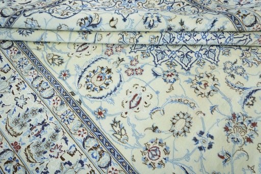 Close-up detail of 2000s Nain rug from Iran / Persia showing Wool weave