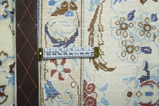 Backside of handmade 2000s Nain rug showing knot structure and weave density