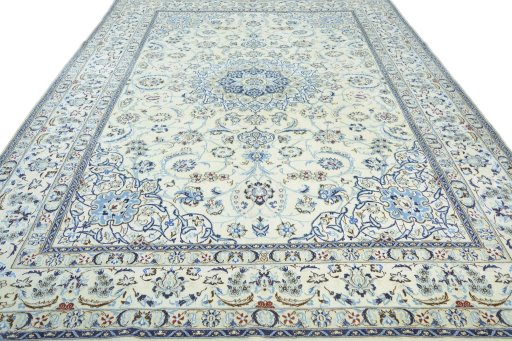 Surface texture of 2000s Nain rug with natural Wool and intricate pattern