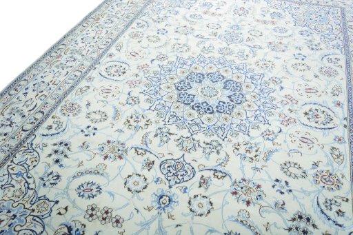 Backside of handmade 2000s Nain rug showing knot structure and weave density