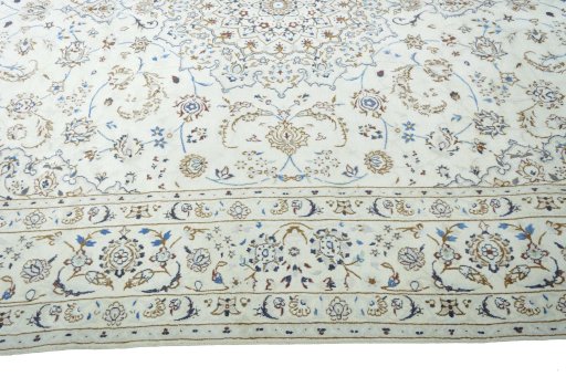 Corner detail of 2000s Nain rug showing border pattern and Wool pile