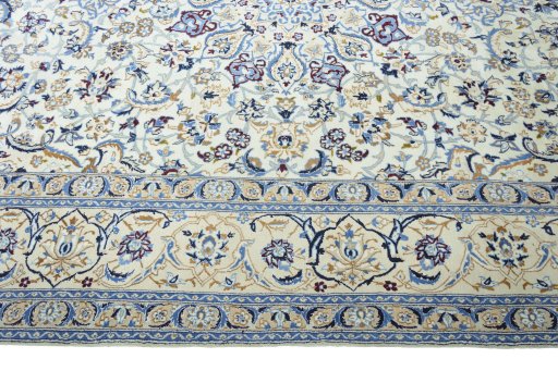 Corner detail of 2000s Nain rug showing border pattern and Wool pile
