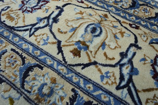 Close-up detail of 2000s Nain rug from Iran / Persia showing Wool weave