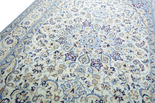 Backside of handmade 2000s Nain rug showing knot structure and weave density