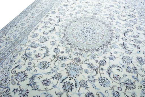 Backside of handmade New Nain rug showing knot structure and weave density