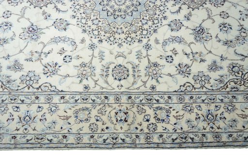 Corner detail of New Nain rug showing border pattern and Cork pile