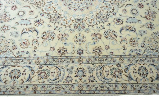 Corner detail of New Nain rug showing border pattern and Cork pile