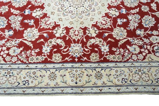 Corner detail of New Nain rug showing border pattern and Wool pile