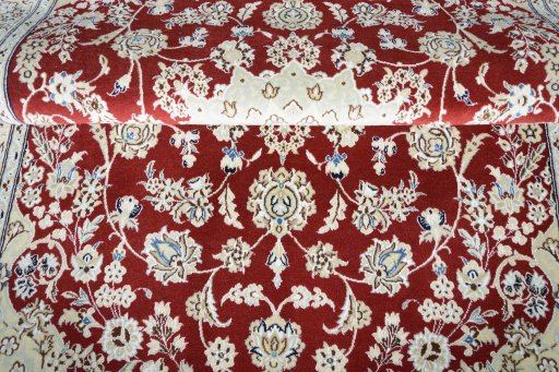 Close-up detail of New Nain rug from Iran / Persia showing Wool weave