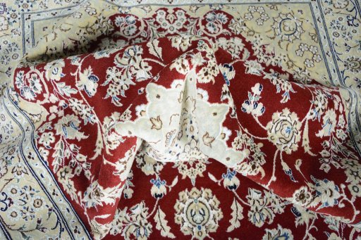 Surface texture of New Nain rug with natural Wool and intricate pattern