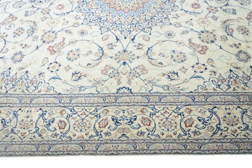 Corner detail of 2000s Nain rug showing border pattern and Cork pile