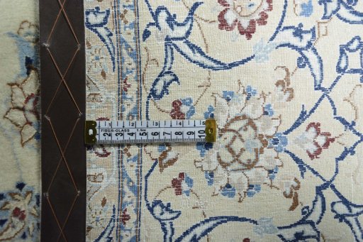 Backside of handmade 2000s Nain rug showing knot structure and weave density