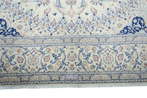 Full view of 2000s Nain rug from Iran / Persia, 375 × 250 cm in Beige tones