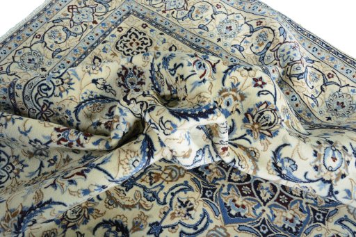 Surface texture of New Nain rug with natural Wool and intricate pattern