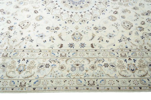 Corner detail of New Nain rug showing border pattern and Wool pile