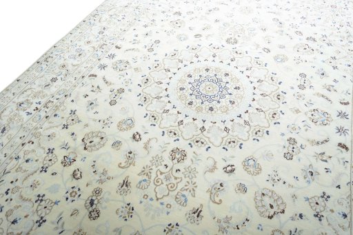 Backside of handmade New Nain rug showing knot structure and weave density