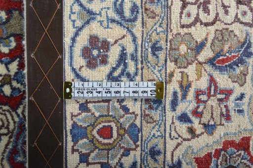 Surface texture of 2000s Nain rug with natural Wool and intricate pattern