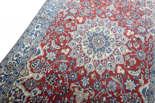 Backside of handmade 2000s Nain rug showing knot structure and weave density